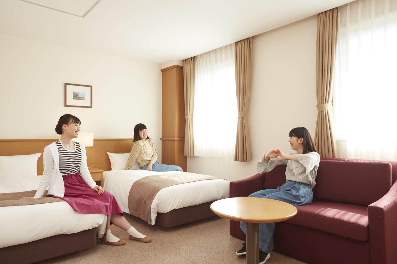 Hotel Folkloro Takahata Bagian luar foto