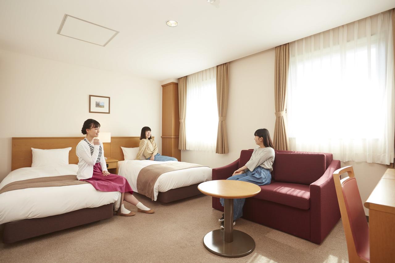 Hotel Folkloro Takahata Bagian luar foto