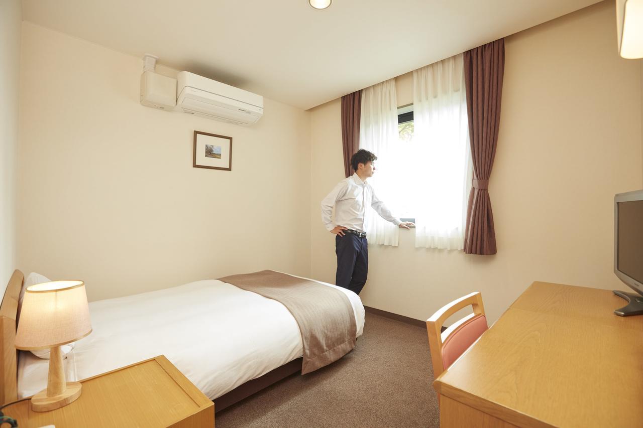 Hotel Folkloro Takahata Bagian luar foto