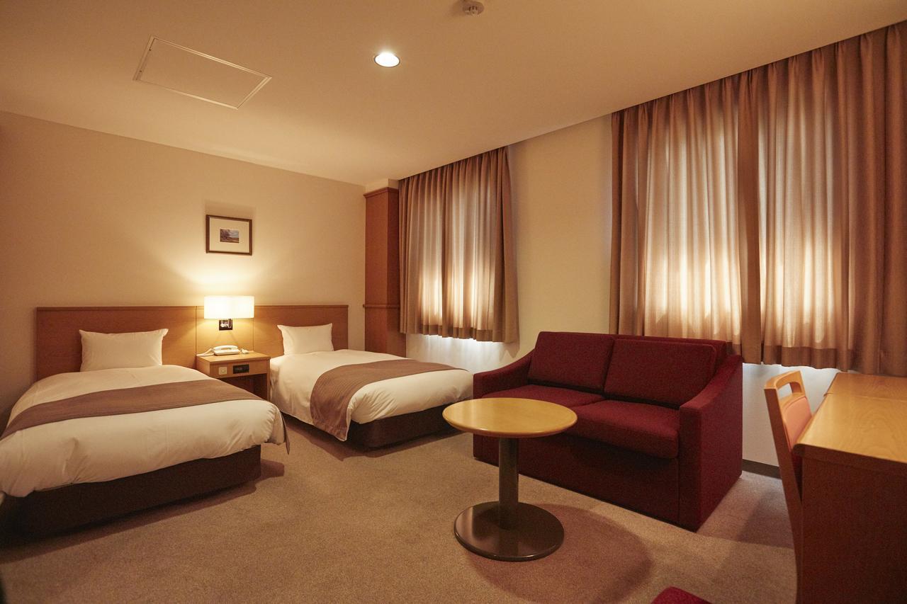 Hotel Folkloro Takahata Bagian luar foto